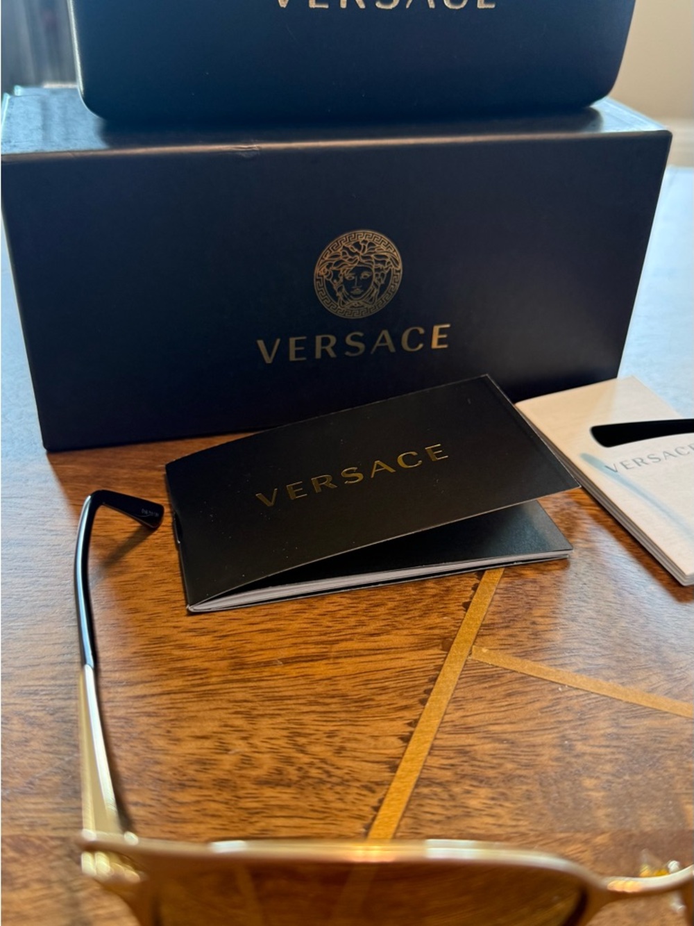 Versace Cat-Eye Sunglasses in Rose Gold with Pink Mirrored Lenses - Picture 4 of 13